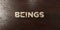Beings - grungy wooden headline on Maple - 3D rendered royalty free stock image