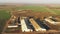 Belarus. Aerial View Of collective farm barn, Cowsheds Sheds. Bird`s-eye View.