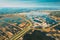 Belarus. Aerial View Of Road Through Ponds In Autumn Landscape. Ponds Of Fisheries In The South Of Belarus. Top View Of