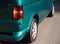 Belarus, Brest - August 04, 2019: Volkswagen T 5 Transporter green passenger van back view. Photographing a modern car in the par