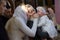 Belarus, Gomel, 25 March. 2018. The Prudhkovsky Church.Mother and godmother on a baptismal rite.Parents with a child in the church