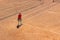 Belarus, Minsk 26.05.18. The boy plays tennis on the orange dirt court. Court hard