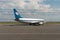 Belarus, Minsk, July 3, 2021: Emergency landing of an aircraft. A mechanic and airport maintenance staff are standing next to the