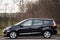 Belarus, Minsk-October 6, 2019:Black car Renault Grand Scenic stands on the road,side view. Photographing a modern car in the park