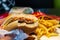 BELARUS, VITEBSK - OCTOBER 21, 2019: French fries and bitten cheeseburger at mcdonalds