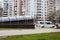 BELARUS, VITEBSK - OCTOBER 22, 2019: underground crossing, trees and tall houses near road