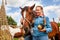 Belarus, Vitebsk region, July 9, 2021. In the children\'s equestrian camp, children take care of the horse.