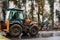 BELARUS, VITEBSK - SEPTEMBER 10, 2020: Excavator rides on road in city center