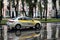 BELARUS, VITEBSK - SEPTEMBER 10, 2020: Taxi car on road in rain