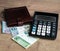 Belarusian money, wallet, calculator and bank card. The concept of paying bills and increasing prices