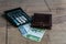 Belarusian money, wallet, calculator and golden bank card. The concept of paying bills and increasing prices