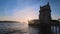 Belem Tower on the bank of the Tagus River on sunset. Lisbon, Portugal