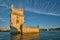 Belem Tower on the bank of the Tagus River on sunset. Lisbon, Portugal