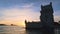 Belem Tower on the bank of the Tagus River on sunset. Lisbon, Portugal