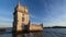 Belem Tower on the bank of the Tagus River on sunset. Lisbon, Portugal
