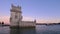 Belem Tower on the bank of the Tagus River in twilight. Lisbon, Portugal