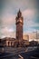 BELFAST, NORTHERN IRELAND, DECEMBER 19, 2018: People passing by Queen's Square where Albert Memorial Clock Tower is situated.