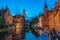 Belfort and the canals of Brugge in the evening