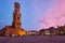 Belfry tower and Grote markt square in Bruges, Belgium on dusk in twilight