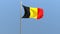 Belgian flag on flagpole.