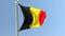 Belgian flag on flagpole.