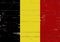 Belgian flag painted on a wooden board