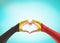 Belgian flag pattern on people heart shape hands clipping path on vintage background