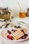 Belgian waffles with berries and honey. National cuisine