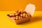 Belgian Waffles tasty fast food street food for take away on yellow background