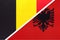 Belgium and Albania, symbol of two national flags from textile. Championship between two European countries