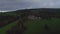 Belgium Ardennes Aerial view, drone rises up and camera tilts down by the castle.