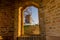 Belgium, Bruges, Bonne Chiere windmill viewed through a window