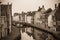 Belgium. Brugge. Old town, canal and historical buildings. Black and white photo