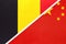 Belgium and China or PRC, symbol of two national flags from textile. Championship between two countries