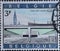 BELGIUM - CIRCA 1969: A postage stamp from Belgium showing a ship in the canal with a tunnel. Text: Schelde tunnel John F Kennedy