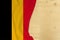 Belgium country colored silk national flag, empty wooden mocap for text, concept of tourism, travel, emigration, global business,