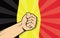 Belgium europe country fight protest symbol with strong hand and flag as background