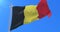 Belgium flag waving at wind in slow with blue sky, loop