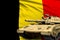 Belgium modern tank with not real design on the flag background - tank army forces concept, military 3D Illustration