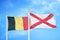 Belgium and Northern Ireland two flags on flagpoles and blue cloudy sky
