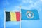 Belgium and Northern Mariana Islands two flags on flagpoles and blue cloudy sky