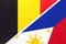 Belgium and Philippines, symbol of two national flags from textile. Championship between two countries