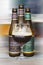 Belgium Straffe Hendrik beers bottles and glass isolated on blurred background