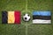 Belgium vs. Estonia flags on soccer field