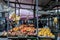 BELGRADE, SERBIA - MAY 25, 2017: Women selling fruits mainly lemons and banana on a stand on Bajlonijeva Pijaca Market in Belgra