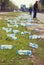 BELGRADE , SERBIA, Woman collecting bottles of water thrown away after marathon