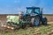 BELICA, CROATIA - Oct 13, 2020: Closeup shot of a tractor plowing hay on a field
