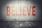 Believe message on the wall