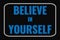 Believe In Yourself text on dark screen