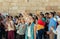 Believer lifts her hands to heaven during group prayer in the courtyard of the Chapel of the Ascension on Mount Eleon - Mount of